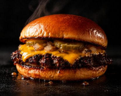 Classic Smash Cheese Burger from SpiceBoxx with halal smash beef patty and melted cheese